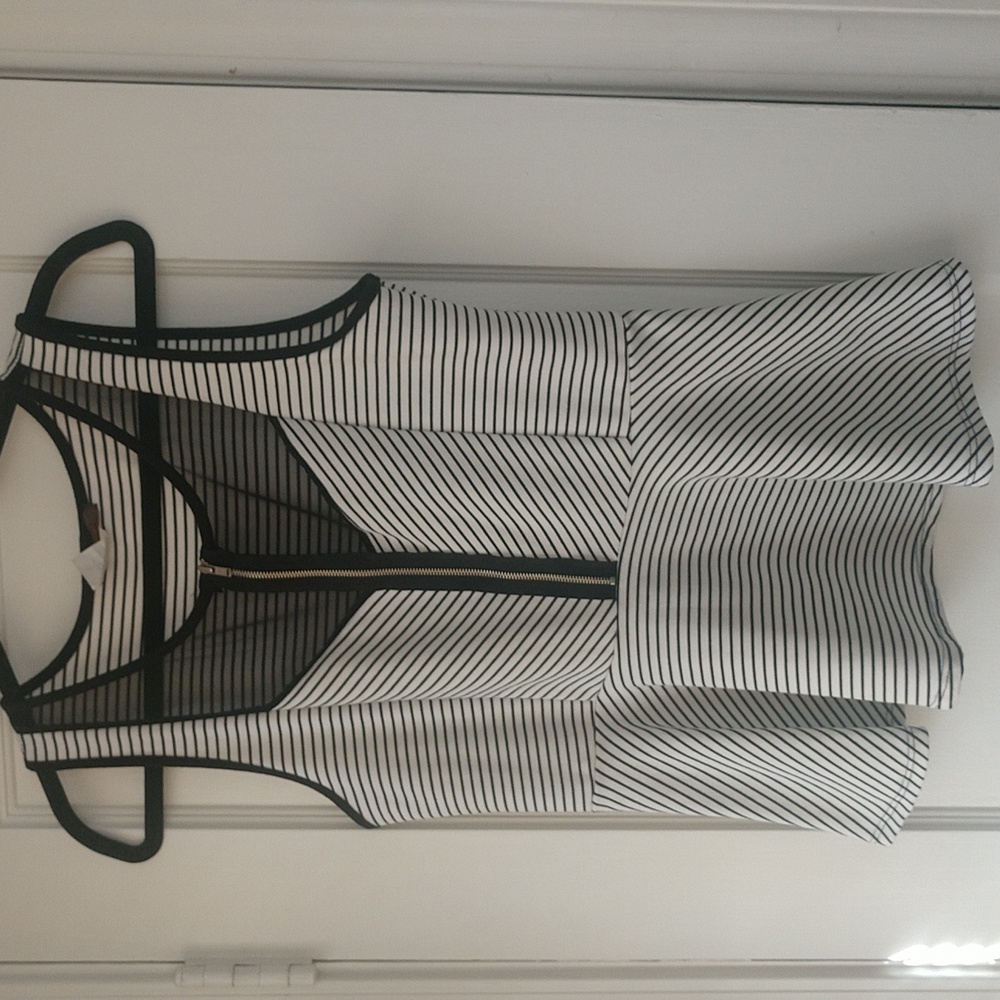 Peplum stripped tank top size Large